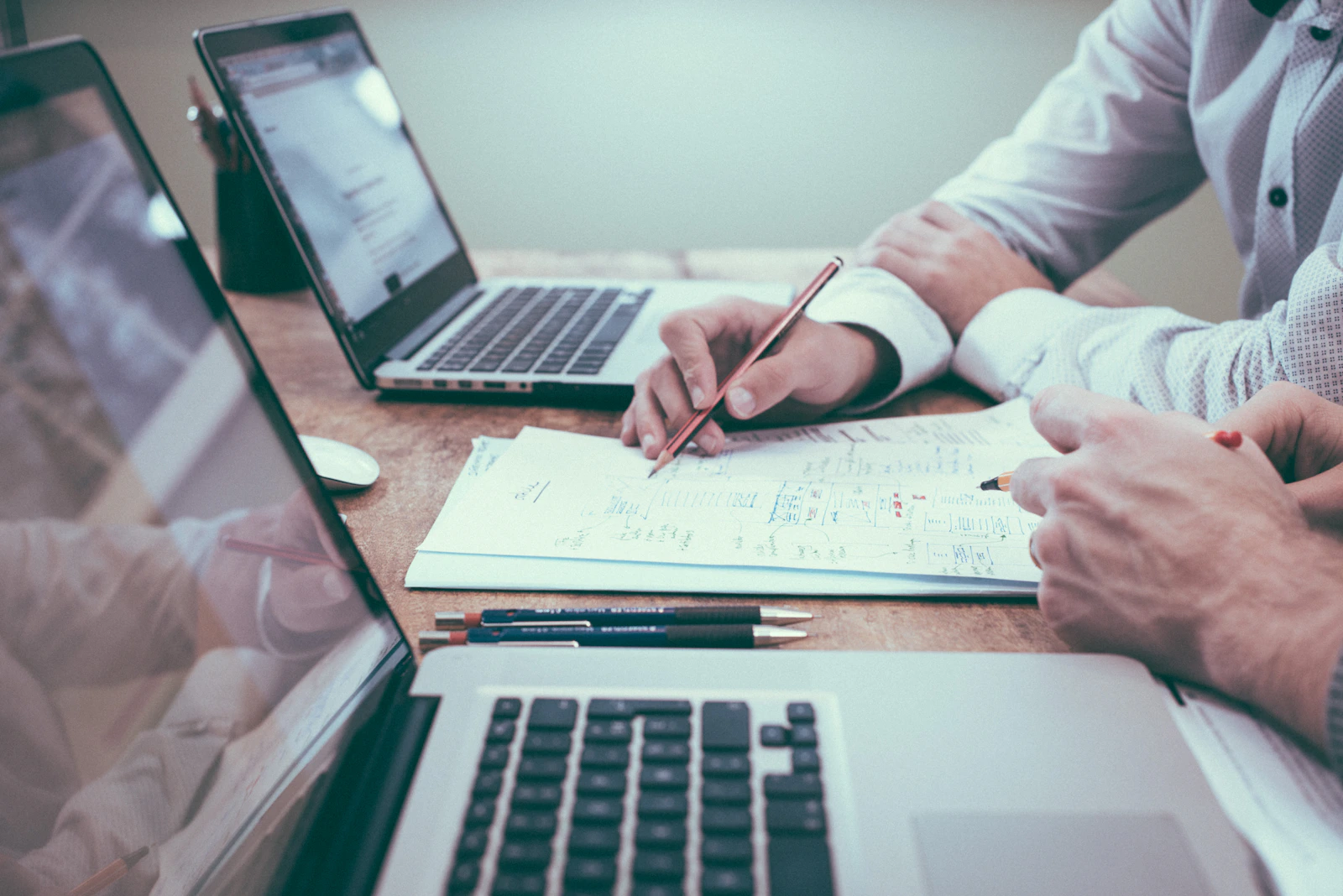 Stock photograph of a business document review, not our clients